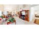 Bright living room featuring vaulted ceilings, open floor plan, and a traditional entertainment center at 1435 Colony Park Dr, Greenwood, IN 46143