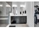 Modern bathroom with double vanity, glass-enclosed shower, and walk-in closet; offering a spa-like experience at 1702 Alvord St, Indianapolis, IN 46202