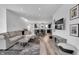 Inviting living room featuring hardwood floors, modern furniture, and bright, airy atmosphere at 1702 Alvord St, Indianapolis, IN 46202