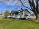 Charming home with a classic design, featuring neat landscaping and a well-maintained exterior at 1802 Poplar St, Anderson, IN 46012