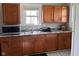 Functional kitchen with ample cabinet space, modern countertops, and stainless steel appliances at 1802 Poplar St, Anderson, IN 46012
