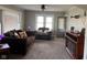 Inviting living area featuring comfortable seating, soft lighting, and a warm ambiance at 1802 Poplar St, Anderson, IN 46012