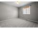 Bedroom with neutral walls, carpet flooring, a window offering natural light, and ceiling fan at 18771 Northridge Dr, Noblesville, IN 46060