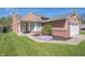 Well-maintained home featuring a lush lawn, colorful flower bed, and attached two-car garage at 18771 Northridge Dr, Noblesville, IN 46060