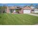 Charming home with a well-manicured lawn and attached two-car garage at 18771 Northridge Dr, Noblesville, IN 46060