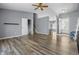 Open-concept living room boasting modern flooring, ample natural light, and easy access to other living spaces at 18771 Northridge Dr, Noblesville, IN 46060