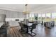 Dining area with lots of natural light connecting the kitchen and living room at 19472 Lewis Cir, Westfield, IN 46074