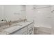 Bathroom with double vanity, granite countertop, and a shower/tub combo at 19522 Wood Farm Pl, Westfield, IN 46074