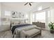Bright bedroom with soft lighting, a king-size bed, and a window that provides plenty of natural sunlight at 19522 Wood Farm Pl, Westfield, IN 46074