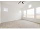 Bright bedroom featuring neutral carpet, vaulted ceilings, and large windows offering natural light at 19522 Wood Farm Pl, Westfield, IN 46074