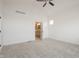 A bright bedroom with neutral carpet and a door leading to the attached bathroom at 19522 Wood Farm Pl, Westfield, IN 46074