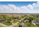 Panoramic aerial view of a peaceful neighborhood surrounded by mature trees and lush landscapes at 250 3 Notch Ln, Bargersville, IN 46106