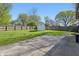 Fenced backyard featuring lush green grass, mature trees, and a storage shed provides ample space and privacy at 250 3 Notch Ln, Bargersville, IN 46106