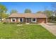 Charming brick ranch with a well-manicured lawn and attached one car garage at 250 3 Notch Ln, Bargersville, IN 46106