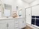 Modern bathroom showcasing a double sink vanity, large mirrors, and a glass door shower at 30 Benfield Dr, Whiteland, IN 46184