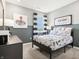 Bedroom with natural light and black and white accents at 30 Benfield Dr, Whiteland, IN 46184