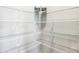 A well-organized walk-in closet features white wire shelving at 30 Benfield Dr, Whiteland, IN 46184
