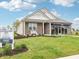 Inviting model home with lush lawn and well-kept landscaping at 30 Benfield Dr, Whiteland, IN 46184