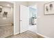Hallway view featuring a closet and bedroom with neutral color scheme at 30 Benfield Dr, Whiteland, IN 46184