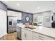 Well-lit kitchen with a center island, modern appliances, and open floorplan at 30 Benfield Dr, Whiteland, IN 46184