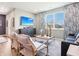 Stylish living room with a modern entertainment center, comfortable seating, and scenic views at 30 Benfield Dr, Whiteland, IN 46184