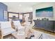 Open concept living space with stylish decor, modern furniture, and a glimpse of the kitchen at 30 Benfield Dr, Whiteland, IN 46184