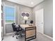 Comfortable home office with desk, and soft natural light at 30 Benfield Dr, Whiteland, IN 46184