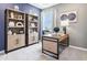 Comfortable home office with desk, bookshelves, and soft natural light at 30 Benfield Dr, Whiteland, IN 46184