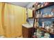 Bright bathroom featuring wood vanity, mirror and storage shelves, ample storage space at 303 W 7Th St, Lapel, IN 46051