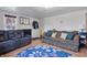 Cozy living room with comfortable seating, area rug and plenty of natural light at 303 W 7Th St, Lapel, IN 46051