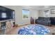 Comfortable living room featuring ample natural light, a modern TV, and cozy seating at 303 W 7Th St, Lapel, IN 46051