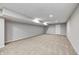 Spacious finished basement featuring a neutral carpet and bright recessed lighting at 3147 Winings Ln, Carmel, IN 46074