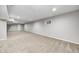 Spacious finished basement featuring a neutral carpet and a window for natural light at 3147 Winings Ln, Carmel, IN 46074