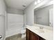 Clean, well-lit bathroom featuring a shower-tub combo, vanity, and modern fixtures at 3147 Winings Ln, Carmel, IN 46074