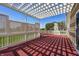 Lovely wooden deck featuring a stylish pergola and lattice surround, perfect for enjoying the outdoors in comfort and privacy at 3147 Winings Ln, Carmel, IN 46074