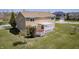 A nice two story home with a well maintained lawn and a nice deck with pergola in back at 3147 Winings Ln, Carmel, IN 46074