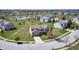 A lovely two story home on a manicured lawn with a brick facade and an attached garage at 3147 Winings Ln, Carmel, IN 46074
