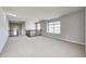 Hallway offers overhead lighting, wood railing, neutral-colored carpet flooring and natural light at 3147 Winings Ln, Carmel, IN 46074