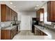 Spacious kitchen featuring stainless steel appliances, ample countertops, and modern cabinets at 3147 Winings Ln, Carmel, IN 46074