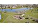 A view of the neighborhood playground near a pond and walking paths at 3147 Winings Ln, Carmel, IN 46074