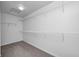 Walk-in closet with wire rack shelving and carpet flooring at 3147 Winings Ln, Carmel, IN 46074