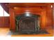 Living room fireplace with dark green marbled mantel at 3208 Brookside Pkwy N Dr, Indianapolis, IN 46218