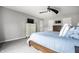Primary bedroom with an overhead fan, TV, dresser and neutral colors at 354 E Arch St, Indianapolis, IN 46202