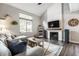 Bright living room featuring a fireplace and cozy furniture at 354 E Arch St, Indianapolis, IN 46202