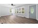 Bright living room with natural light and wood floors next to the home entrance at 3541 N Linwood Ave, Indianapolis, IN 46218