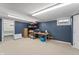 Finished basement with work bench and storage at 3818 Kessler Boulevard East Dr, Indianapolis, IN 46220