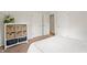 Bedroom featuring built-in storage and closet doors at 3818 Kessler Boulevard East Dr, Indianapolis, IN 46220