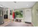 Inviting foyer with a coat rack, shoe storage, and a view to the backyard at 3818 Kessler Boulevard East Dr, Indianapolis, IN 46220