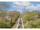 A tree-lined walking trail near the property, perfect for recreation and exercise at 3818 Kessler Boulevard East Dr, Indianapolis, IN 46220