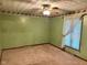 Comfortable bedroom with ceiling fan and neutral carpeting, offering a cozy retreat at 3920 Pigeon Creek Ln, Indianapolis, IN 46234